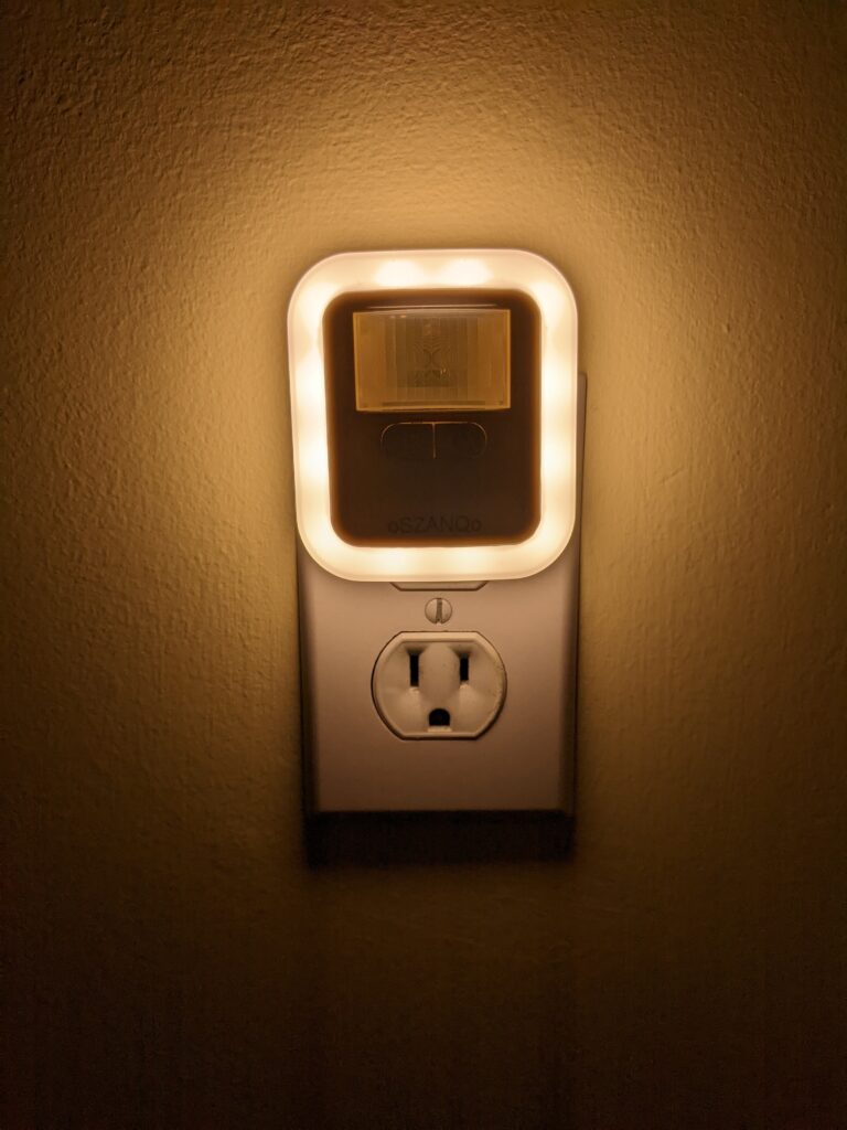 Image shows the size of the night light and demonstrates the 3000K colour temperature