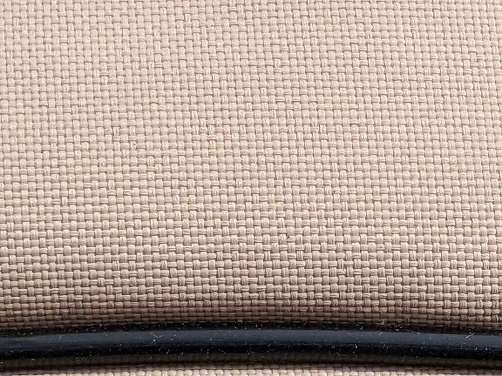 This image shows the grid pattern stitching which increases the strength of the cover and shows how fine the stitching is