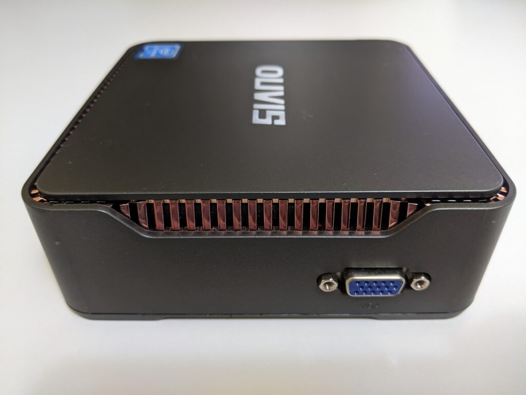 Side view of the OUVISLITE mini pc.  In this image the VGA port is shown
