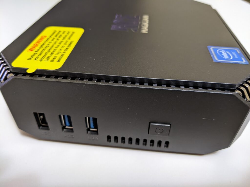Image showing peripheral ports on the side including a USB 2.0 port, and 2 USB 3.0 ports along with the power button and some ventilation